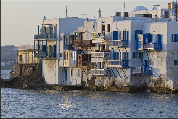 Ancient buildings directly overlook the sea