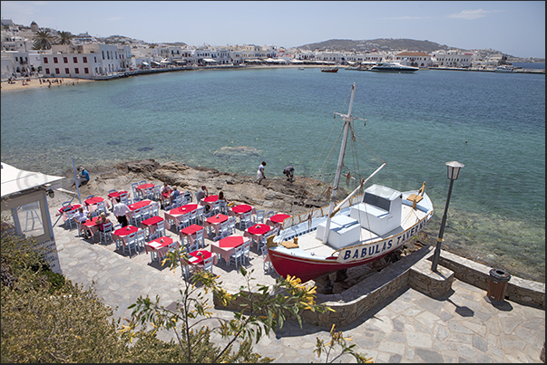 Magali Bay and the town of Mykonos on the horizon Magali Bay and the town of Mykonos on the horizon