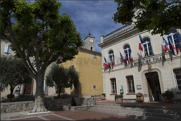The main square on Rue Napoléon with the town hall The main square on Rue Napoléon with the town hall