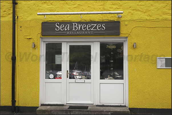 Portree fishing village on the east coast of the island. Shops, bars and restaurants on the seafront Portree fishing village on the east coast of the island. Shops, bars and restaurants on the seafront