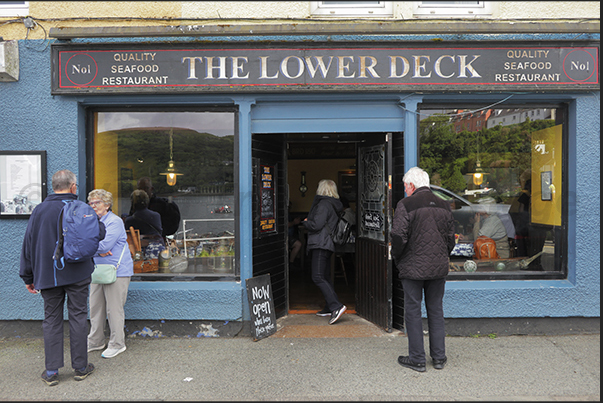 Portree fishing village on the east coast of the island. Shops, bars and restaurants on the seafront Portree fishing village on the east coast of the island. Shops, bars and restaurants on the seafront