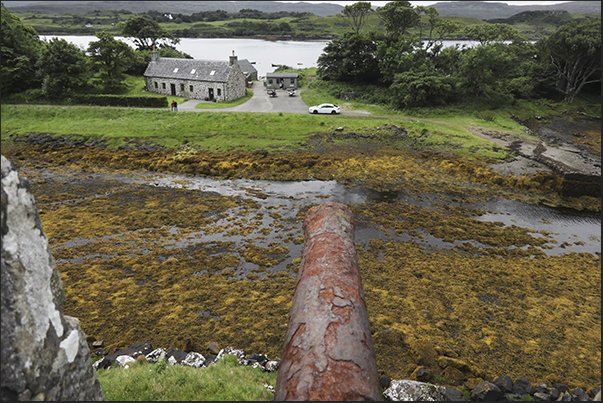 Abhainn Chaisteil river in front of the walls of Dunvegan Castle Abhainn Chaisteil river in front of the walls of Dunvegan Castle