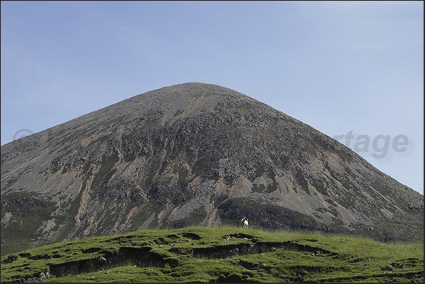The barren mountains along the coast of the southern peninsula of the island The barren mountains along the coast of the southern peninsula of the island
