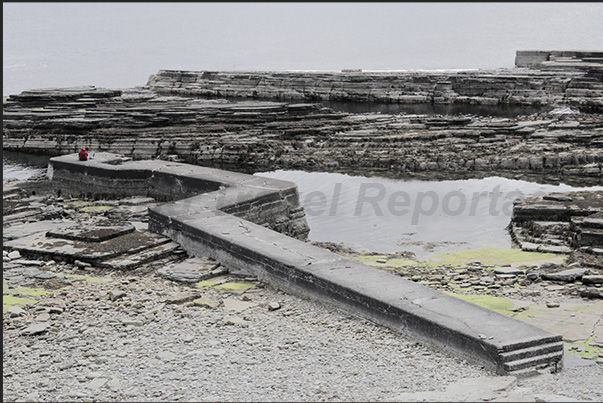 Low tide at the base of the cliffs along the north east coast