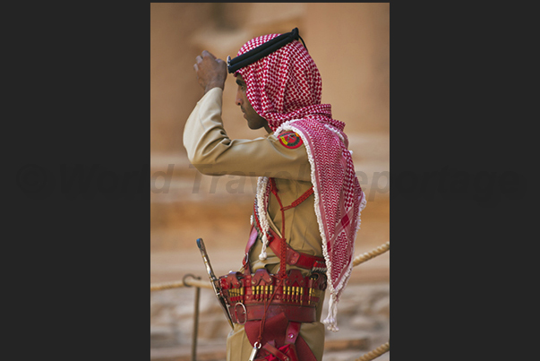 Touristic guard in front of the temple of El-Khasneh