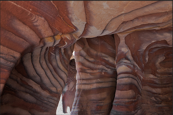 The Nabataeans exploited the designs created by the layers of sand and oxides to decorate their homes in a natural way