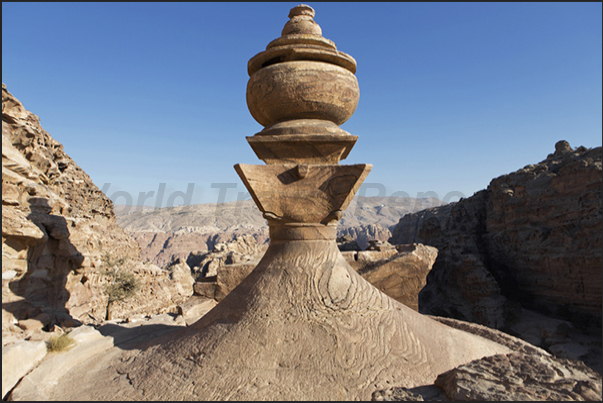 The urn on the roof of the Al-Deir Temple known as The Monastery The urn on the roof of the Al-Deir Temple known as The Monastery