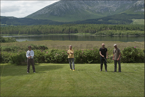 Lough Inagh Lodge, near Recess. Exercises of launch with the fishing rod Lough Inagh Lodge, near Recess. Exercises of launch with the fishing rod