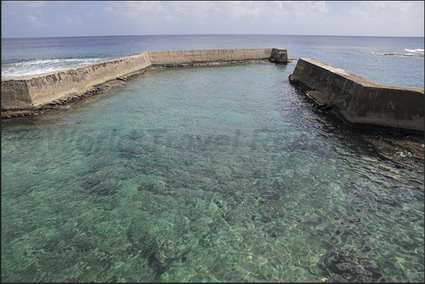 For those arriving from the sea, the only access to the island is the small port on the north coast For those arriving from the sea, the only access to the island is the small port on the north coast