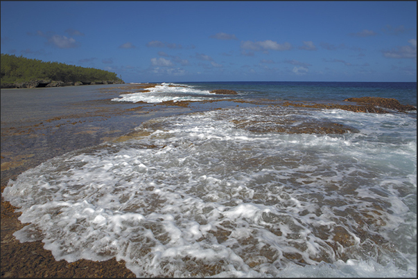 During high tide, the reef platform is submerged by the waves