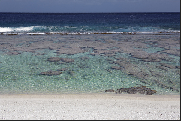 During high tide, the reef platform is submerged by the waves