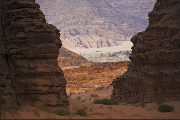 Wadi Ram is a continuous succession of plains interrupted by wide valleys formed by high rocky mountains Wadi Ram is a continuous succession of plains interrupted by wide valleys formed by high rocky mountains