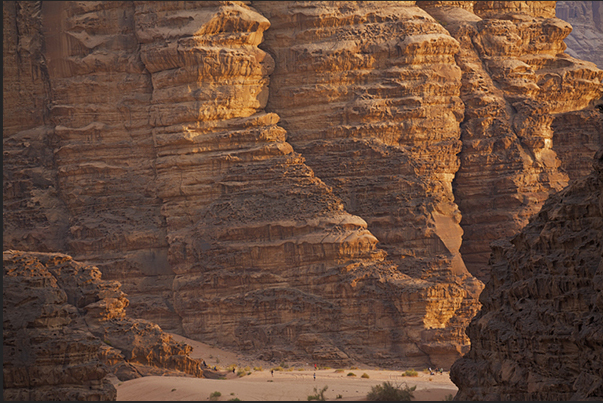 At sunset, the mountains begin to color, first orange and then red