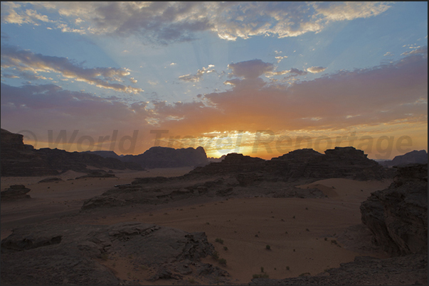 The last ray of sunshine on the red desert The last ray of sunshine on the red desert