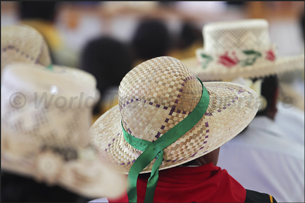 On Sunday, at church at Arutanga, women wear their best hats, some simple others elaborated