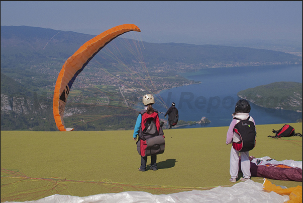 Annecy Lake, the starting point for paragliders at Col de la Forclaz above the village of Angon (south east coast of the lake) Annecy Lake, the starting point for paragliders at Col de la Forclaz above the village of Angon (south east coast of the lake)