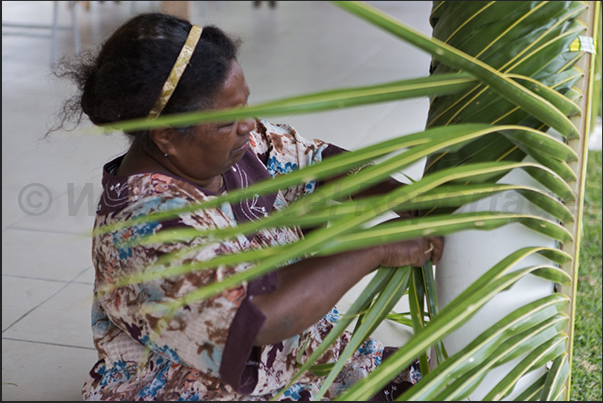 Roh village. The women intertwined leaves of the palm trees on the occasion of Wajuyu Festival Roh village. The women intertwined leaves of the palm trees on the occasion of Wajuyu Festival