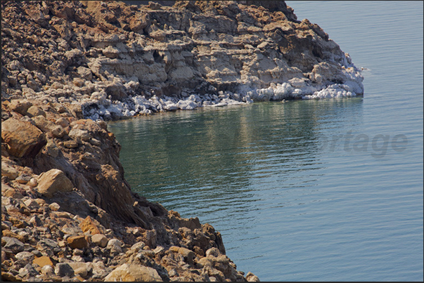 The cliffs of Dead Sea, are covered with a thick layer of salt due to the strong evaporation of the water