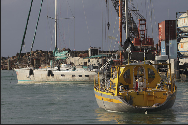 The port of Avarua (north coast). The only one port on the island