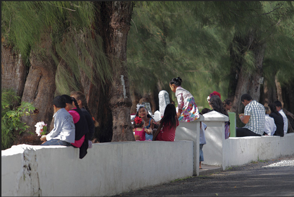 On Sunday, the population is in the gardens and along the roads leading to the various churches in town On Sunday, the population is in the gardens and along the roads leading to the various churches in town
