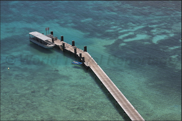 Pier of the ferry that connects the city of Noumea with the island where is the lighthouse Amédée Pier of the ferry that connects the city of Noumea with the island where is the lighthouse Amédée