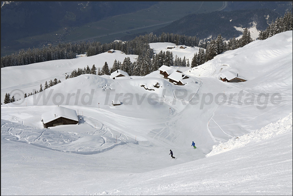 The ski slopes in the mountains above the town of Meiringen The ski slopes in the mountains above the town of Meiringen