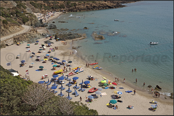 The beach of Masua. Once, site of an important mining town for the processing of minerals extracted from the mines of Porto Flavia The beach of Masua. Once, site of an important mining town for the processing of minerals extracted from the mines of Porto Flavia