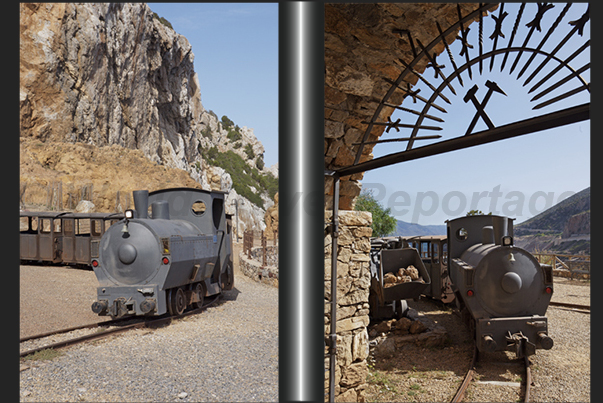 Train mine of Henry Gallery (Buggerru). The train that once pulls carts full of ore out in the mine, now pulls carts full of tourists