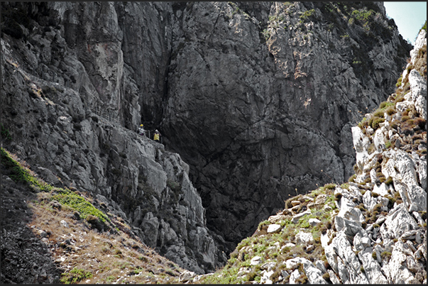 Village of Buggerru. Mines which penetrate the rocky cliff overlooking the sea. The return is to walk on a coastal path