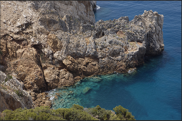 The cliff near the village of Buggerru. Walk on the path along the coast