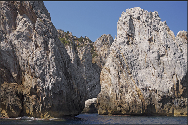 The cliff between the village of Buggerru and the bay of Cala Domestica The cliff between the village of Buggerru and the bay of Cala Domestica