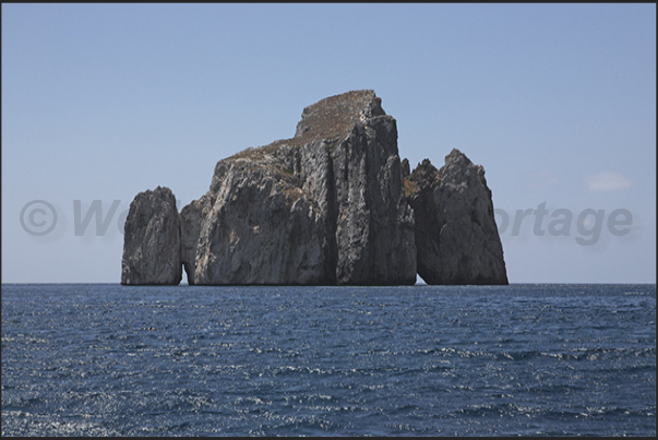 Masua Bay. The island called Pan di Zucchero (Sugarloaf) Masua Bay. The island called Pan di Zucchero (Sugarloaf)