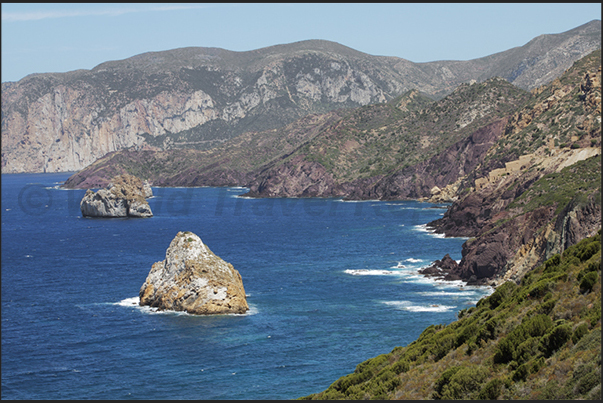 The cliffs below the village of Nebida between Masua Bay and the village of Portoscuso The cliffs below the village of Nebida between Masua Bay and the village of Portoscuso