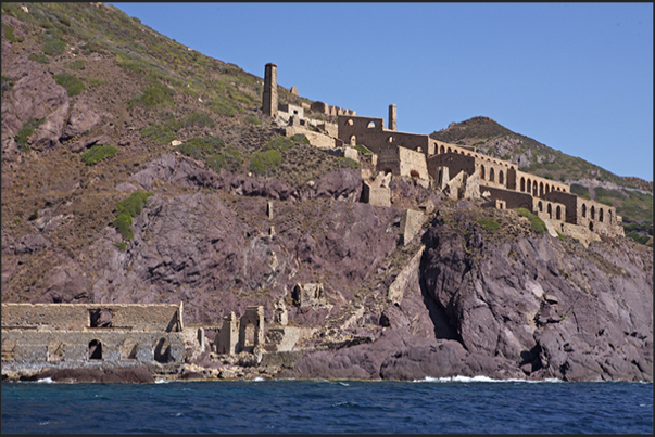 The cliffs between Masua Bay and Portoscuso. The ruins of Lamarmora laundry where washed the mineral mined from Nebida