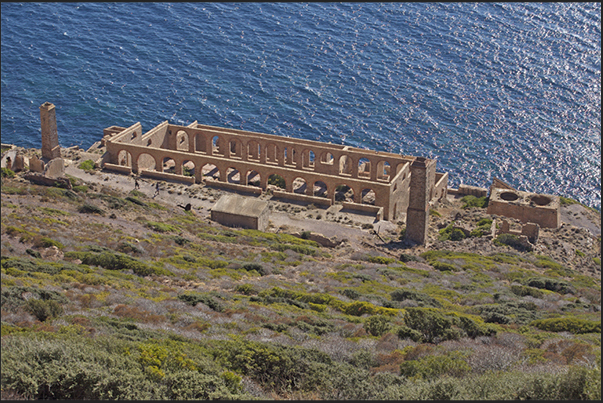 The cliffs between Masua Bay and Portoscuso. The ruins of the Lamarmora laundry.