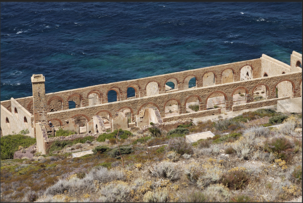 Cliff of Nebida, the ruins of  Lamarmora laundry. In these structures, there was also a selection of minerals then loaded onto ships