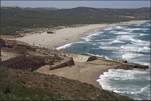 Fontanamare Beach, in the stretch of coast between Nebida and Portoscuso. The beach frequented by surfers and kite surfing