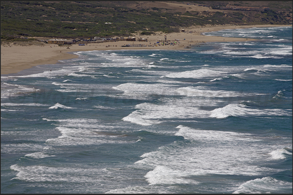 Fontanamare Beach, in the stretch of coast between Nebida and Portoscuso. The beach frequented by surfers and kite surfing