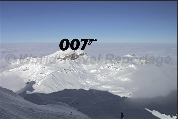 Panorama seen from Piz Gloria restaurant built on the summit of Mount Schilthorn with the logo of James Bond on the windows Panorama seen from Piz Gloria restaurant built on the summit of Mount Schilthorn with the logo of James Bond on the windows