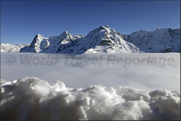 The sea of clouds covering the valley of Murren The sea of clouds covering the valley of Murren