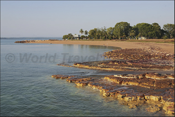 Cox Peninsula (west side of Darwin Bay). The sunset light highlights the red veins (oxidation of iron) present in the white rocks