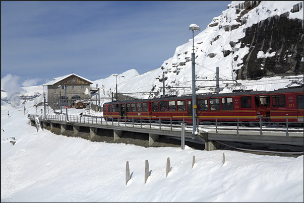 The Jungfraujoch train before entering the long tunnel dug in the mountains Eiger and Monch The Jungfraujoch train before entering the long tunnel dug in the mountains Eiger and Monch