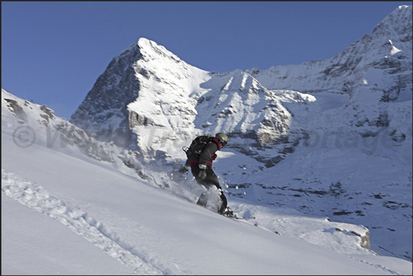 Descent to the town of Wengen with, behind, the Mount Eiger Descent to the town of Wengen with, behind, the Mount Eiger