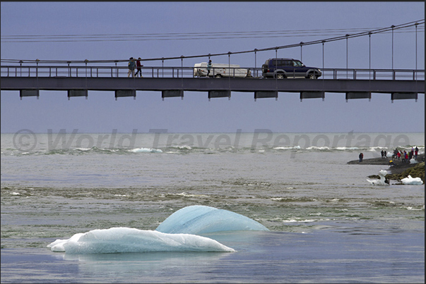 Some icebergs going out from the lake formed by Jokulsarlon Glacier, directly in the sea