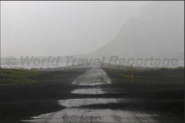 The road leading to the lighthouse of Hvalnes near the town of Hofn The road leading to the lighthouse of Hvalnes near the town of Hofn
