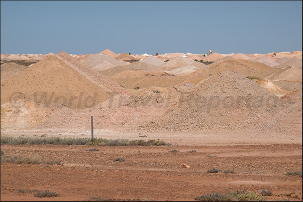 The millions of wells drilled to find the opal stones, create a strange landscapes around the underground town of Coober Pedy The millions of wells drilled to find the opal stones, create a strange landscapes around the underground town of Coober Pedy