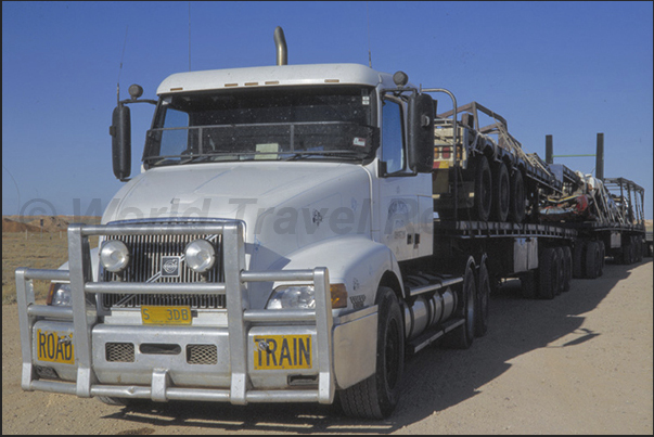 The road train. The long vehicle that runs on the Stuart Highway The road train. The long vehicle that runs on the Stuart Highway