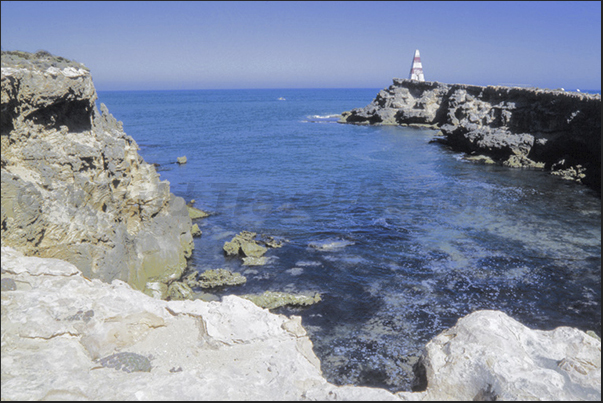 The cliffs and the lighthouse of Cape Robe The cliffs and the lighthouse of Cape Robe
