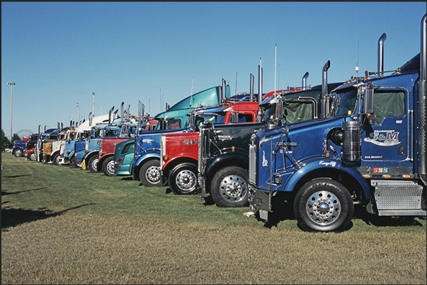 All 500 trucks are parked in the meadows around the town All 500 trucks are parked in the meadows around the town