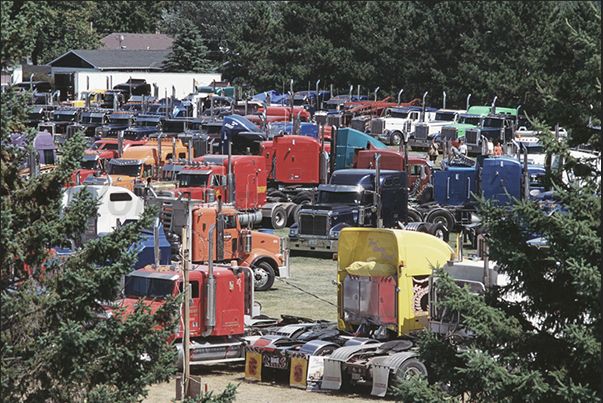 All 500 trucks are parked in the meadows around the town All 500 trucks are parked in the meadows around the town